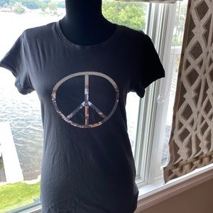 Short sleeve sparkle peace sign t shirt size Xl.  Runs small